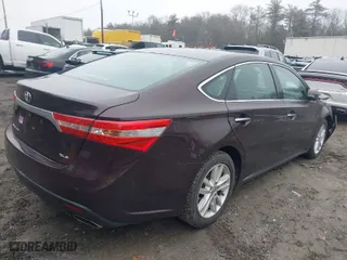 2014 Toyota Avalon Limited with VIN 4T1BK1EB9EU133483, listed as a IAAI auction lot 41744776 with 102,987 mi miles. Bid and sale history available at carsss.com. Image 4.