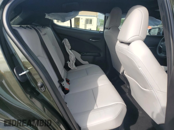 2024 Lexus UX 250h Premium с VIN JTHP9JBH8R2072433, выставлен на аукционе Copart как лот 57704904 с пробегом 9 397 миль миль и Списание • Salvage title. История ставок и продаж доступна на DreamBid. Изображение 11.