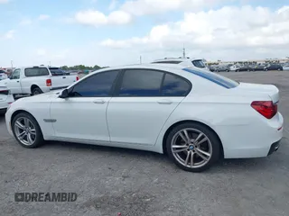 2014 BMW 7 Series 740i with VIN WBAYA6C53ED144195, listed as a IAAI auction lot 41720500 with 123,776 mi miles and . Bid and sale history available at DreamBid. Image 14.