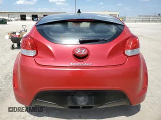 2016 Hyundai Veloster z VIN KMHTC6ADXGU270540, wystawiony jako Copart lot #54575165 z przebiegiem 122 606 mil mil oraz Szkody całkowita. Historia ofert i sprzedaży dostępna na DreamBid. Obrazek 6.