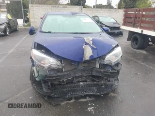 2014 Toyota Corolla L with VIN 5YFBURHE8EP173523, listed as a IAAI auction lot 41802729 with 77,336 mi miles and . Bid and sale history available at DreamBid. Image 13.