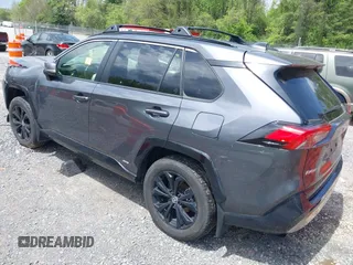 2023 Toyota RAV4 Hybrid SE with VIN JTM16RFV9PD113152, listed as a IAAI auction lot 42177056 with 41,204 mi miles and . Bid and sale history available at DreamBid. Image 3.