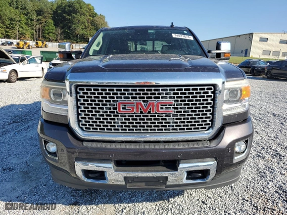 2015 GMC Sierra 3500HD Denali with VIN 1GT424E86FF533171, listed as a Copart auction lot 74837874 with 128,234 mi miles and Salvage Title. Bid and sale history available at carsss.com. Image 5.