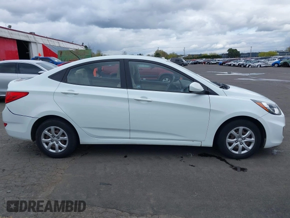 2013 Hyundai Accent GLS with VIN KMHCT4AE6DU291877, listed as a IAAI auction lot 41931876 with 136,781 mi miles. Bid and sale history available at carsss.com. Image 13.