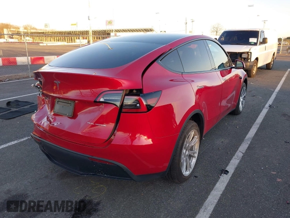 2023 Tesla Model Y Long Range with VIN 7SAYGDEE1PF860207, listed as a IAAI auction lot 41101287 with 24,320 mi miles. Bid and sale history available at carsss.com. Image 4.