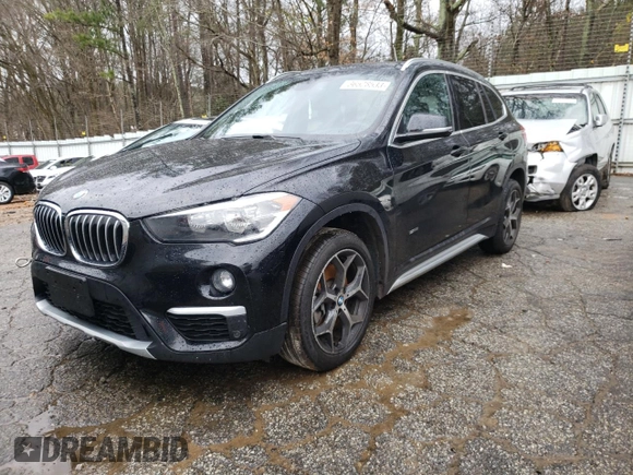 2018 BMW X1 sDrive28i with VIN WBXHU7C37J5L05153, listed as a Copart auction lot 36528533 with 40,704 mi miles. Bid and sale history available at carsss.com. Image 1.