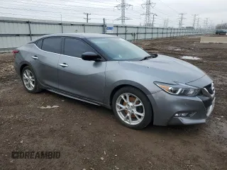 2016 Nissan Maxima SV with VIN 1N4AA6AP2GC396088, listed as a Copart auction lot 52641085 with Not Provided miles and Salvage Title. Bid and sale history available at DreamBid. Image 4.