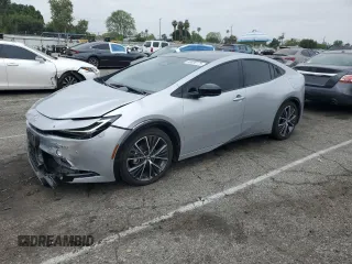 2024 Toyota Prius LE z VIN JTDACAAUXR3034252, wystawiony jako Copart lot #58020175 z przebiegiem 5 663 mil mil oraz Szkoda całkowita • Salvage title. Historia ofert i sprzedaży dostępna na DreamBid. Obrazek 1.