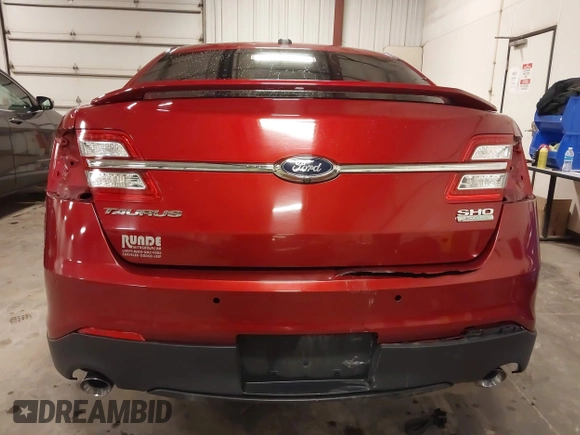 2014 Ford Taurus SHO with VIN 1FAHP2KT9EG130834, listed as a IAAI auction lot 41748199 with 98,857 mi miles and . Bid and sale history available at carsss.com. Image 6.