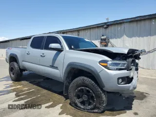 2020 Toyota Tacoma SR5 z VIN 3TMDZ5BN0LM094976, wystawiony jako Copart lot #58695515 z przebiegiem 84 025 mil mil oraz Czysty tytuł • Clean title. Historia ofert i sprzedaży dostępna na DreamBid. Obrazek 4.