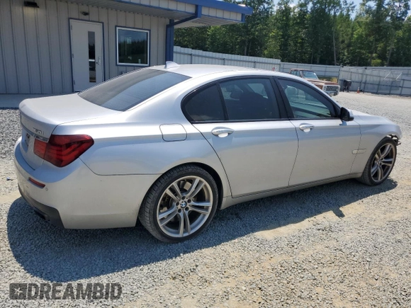 2013 BMW 7 Series 750i with VIN WBAYA8C58DC996865, listed as a Copart auction lot 61831294 with 151,238 mi miles and Salvage Title. Bid and sale history available at DreamBid. Image 3.