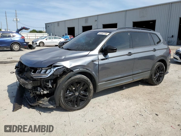 2022 Volkswagen Tiguan SE R-Line Black with VIN 3VVCB7AX6NM081880, listed as a Copart auction lot 54102735 with 52,010 mi miles and Salvage Title. Bid and sale history available at DreamBid. Image 1.