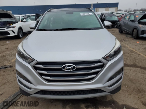 2018 Hyundai Tucson Value with VIN KM8J33A28JU748241, listed as a Copart auction lot 87492464 with 56,457 mi miles and Salvage Title. Bid and sale history available at carsss.com. Image 5.