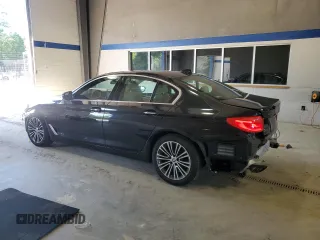 2018 BMW 5 Series 540i xDrive with VIN WBAJE7C56JWC57314, listed as a Copart auction lot 60610715 with 73,015 mi miles and Salvage title. Bid and sale history available at DreamBid. Image 2.