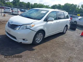 2016 Toyota Sienna XLE with VIN 5TDYK3DC4GS748888, listed as a IAAI auction lot 42605968 with 164,811 mi miles and . Bid and sale history available at DreamBid. Image 22.