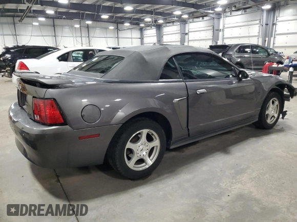 2003 Ford Mustang Deluxe z VIN 1FAFP44433F369534, wystawiony jako Copart lot #76606794 z przebiegiem 88 503 mil mil oraz Szkoda całkowita • Salvage title. Historia ofert i sprzedaży dostępna na DreamBid. Obrazek 3.