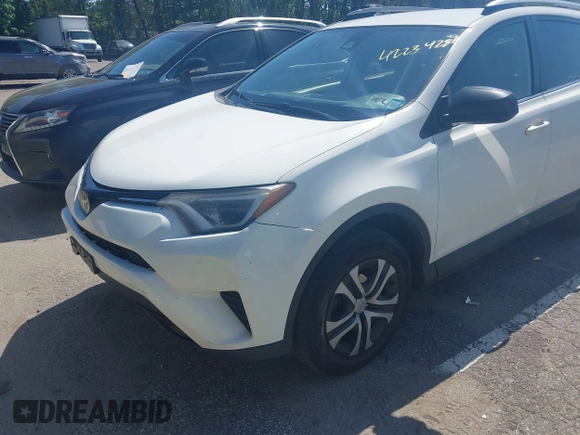 2017 Toyota RAV4 LE with VIN JTMBFREV4HJ112595, listed as a IAAI auction lot 42234289 with 207,379 mi miles and . Bid and sale history available at carsss.com. Image 6.