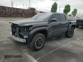 2025 Toyota Tacoma SR with VIN 3TMLB5JN4SM104263, listed as a Copart auction lot 54402775 with 1,010 mi miles and Salvage Title. Bid and sale history available at DreamBid. Image 1.