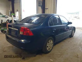 2003 Honda Civic LX with VIN 2HGES16583H529254, listed as a IAAI auction lot 42010247 with 238,517 mi miles. Bid and sale history available at carsss.com. Image 4.