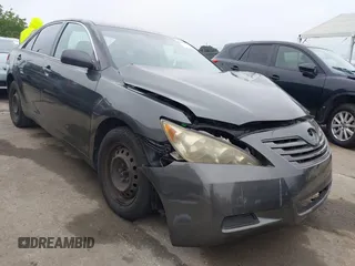 2009 Toyota Camry LE z VIN 4T1BK46K69U592332, wystawiony jako IAAI lot #42099398 z przebiegiem 106 653 mil mil oraz . Historia ofert i sprzedaży dostępna na DreamBid. Obrazek 1.