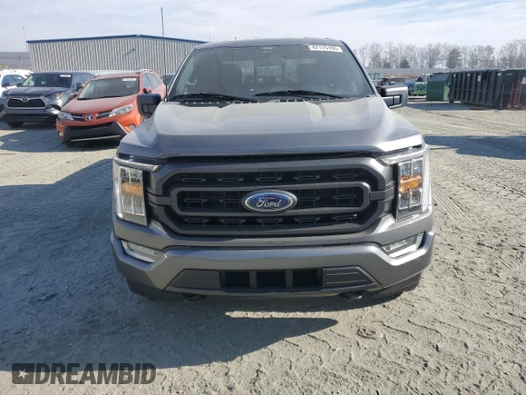 2021 Ford F-150 XL with VIN 1FTEW1EP5MFB61351, listed as a Copart auction lot 47175195 with 64,269 mi miles and Clean Title. Bid and sale history available at carsss.com. Image 5.