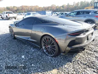 2021 McLaren GT z VIN SBM22GCA8MW001374, wystawiony jako Copart lot #82147064 z przebiegiem 32 562 mil mil oraz Nie do naprawy. Historia ofert i sprzedaży dostępna na DreamBid. Obrazek 2.