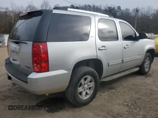2012 GMC Yukon SLT with VIN 1GKS1CE08CR203822, listed as a Copart auction lot 82955253 with 122,508 mi miles and Salvage Title. Bid and sale history available at carsss.com. Image 3.