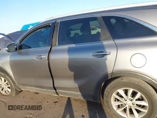 2018 Kia Sorento LX with VIN 5XYPG4A50JG387396, listed as a IAAI auction lot 40848247 with Not Provided miles and . Bid and sale history available at DreamBid. Image 14.