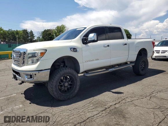 2016 Nissan Titan Platinum Reserve z VIN 1N6BA1F41GN504539, wystawiony jako Copart lot #64812975 z przebiegiem 143 144 mil mil oraz Szkoda całkowita • Salvage title. Historia ofert i sprzedaży dostępna na DreamBid. Obrazek 1.