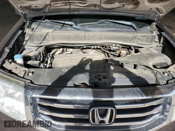 2012 Honda Pilot EX-L with VIN 5FNYF4H72CB056425, listed as a Copart auction lot 53712675 with 120,909 mi miles and Salvage Title. Bid and sale history available at DreamBid. Image 12.