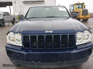 2006 Jeep Grand Cherokee Laredo with VIN 1J4GR48KX6C135070, listed as a IAAI auction lot 41966282 with 142,833 mi miles. Bid and sale history available at carsss.com. Image 6.