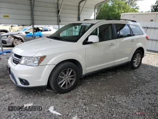 2013 Dodge Journey SXT with VIN 3C4PDDBG7DT641451, listed as a Copart auction lot 60043875 with 212,390 mi miles and Salvage title. Bid and sale history available at DreamBid. Image 1.