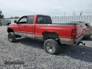 2000 Dodge 2500 z VIN 1B7KF23Z6YJ187490, wystawiony jako Copart lot #57873375 z przebiegiem 238 769 mil mil oraz Szkody całkowita. Historia ofert i sprzedaży dostępna na DreamBid. Obrazek 2.