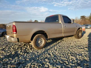 1999 Ford F-150 Work Series with VIN 1FTZF1722XNC16545, listed as a Copart auction lot 86887214 with 137,192 mi miles and Clean Title. Bid and sale history available at carsss.com. Image 3.
