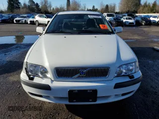 2002 Volvo S40 with VIN YV1VS29542F821073, listed as a Copart auction lot 87377204 with 57,474 mi miles and Salvage Title. Bid and sale history available at carsss.com. Image 5.