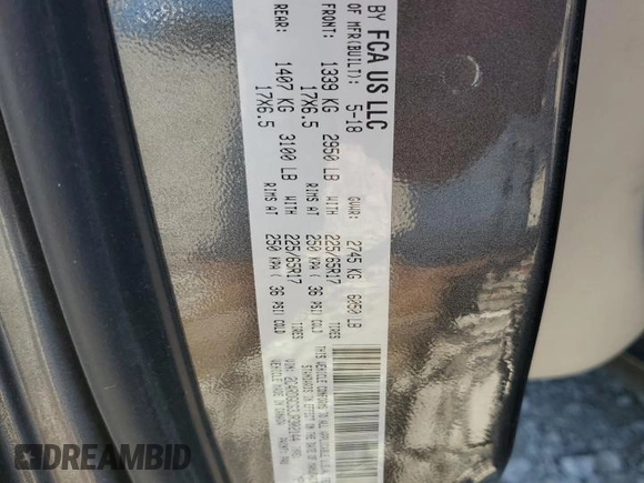 2018 Dodge Grand Caravan SXT with VIN 2C4RDGCG3JR302144, listed as a Copart auction lot 53534705 with 134,208 mi miles and Clean Title. Bid and sale history available at DreamBid. Image 13.