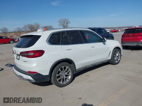 2019 BMW X5 xDrive40i with VIN 5UXCR6C50KLL08346, listed as a IAAI auction lot 41824070 with 75,000 mi miles and . Bid and sale history available at DreamBid. Image 4.