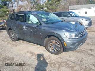 2021 Volkswagen Tiguan S with VIN 3VV1B7AX1MM005781, listed as a IAAI auction lot 40768656 with 48,109 mi miles and . Bid and sale history available at DreamBid. Image 1.