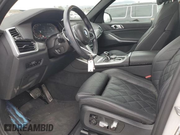 2023 BMW X5 xDrive40i with VIN 5UXCR6C02P9P07428, listed as a Copart auction lot 53520485 with 46,006 mi miles and Salvage title. Bid and sale history available at DreamBid. Image 7.