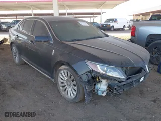 2013 Lincoln MKS with VIN 1LNHL9DK6DG615848, listed as a IAAI auction lot 41615072 with 153,292 mi miles. Bid and sale history available at carsss.com. Image 1.