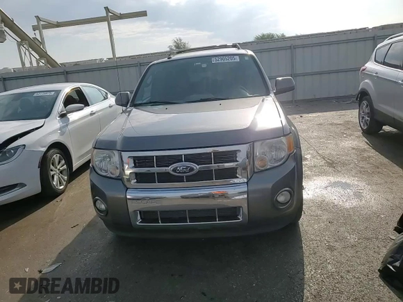 2012 Ford Escape Limited z VIN 1FMCU0EG1CKB30638, wystawiony jako Copart lot #52905205 z przebiegiem 169 683 mil mil oraz Szkoda całkowita • Salvage title. Historia ofert i sprzedaży dostępna na DreamBid. Obrazek 11.