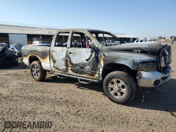 2005 Dodge Ram 2500 SLT with VIN 3D7KS28C25G842795, listed as a Copart auction lot 74001034 with 0 mi miles and Salvage Title. Bid and sale history available at carsss.com. Image 4.