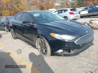 2018 Ford Fusion SE with VIN 3FA6P0HDXJR157605, listed as a IAAI auction lot 40979897 with 128,322 mi miles. Bid and sale history available at carsss.com. Image 1.