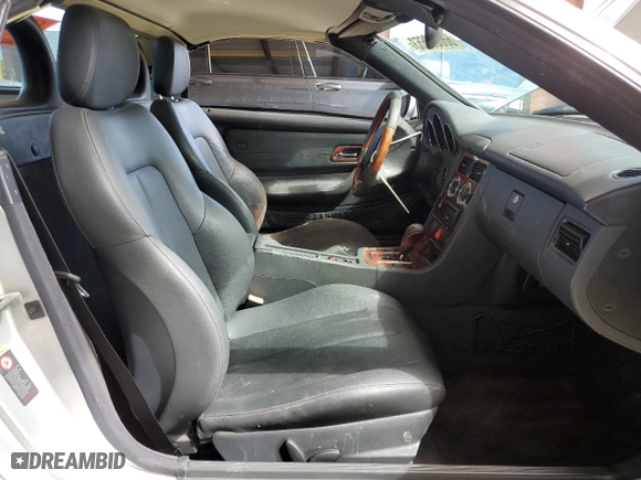2003 Mercedes-Benz SLK-Class 3.2L with VIN WDBKK65F83F285825, listed as a Copart auction lot 66683653 with 92,826 mi miles and Salvage Title. Bid and sale history available at carsss.com. Image 7.