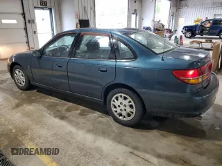 2002 Saturn LS z VIN 1G8JU54F22Y577454, wystawiony jako Copart lot #55771555 z przebiegiem 134 314 mil mil oraz Szkody całkowita. Historia ofert i sprzedaży dostępna na DreamBid. Obrazek 2.