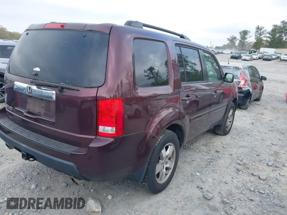 2011 Honda Pilot EX-L with VIN 5FNYF3H61BB050776, listed as a IAAI auction lot 41934621 with 172,424 mi miles and . Bid and sale history available at DreamBid. Image 4.