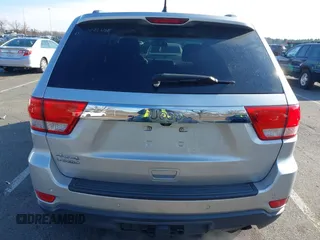 2011 Jeep Grand Cherokee Laredo z VIN 1J4RR4GG2BC511289, wystawiony jako IAAI lot #41240075 z przebiegiem 88 140 mil mil oraz . Historia ofert i sprzedaży dostępna na DreamBid. Obrazek 16.