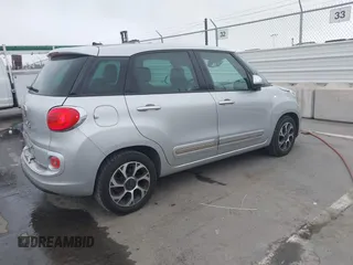 2014 FIAT 500L Lounge z VIN ZFBCFACH8EZ005035, wystawiony jako IAAI lot #41824368 z przebiegiem 80 914 mil mil oraz . Historia ofert i sprzedaży dostępna na DreamBid. Obrazek 4.