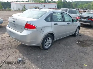 2009 Ford Focus SE with VIN 1FAHP35N69W186180, listed as a IAAI auction lot 41979048 with 179,837 mi miles. Bid and sale history available at carsss.com. Image 4.