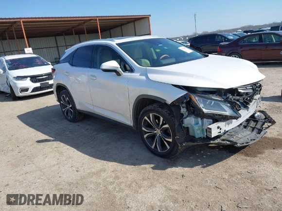 2016 Lexus RX 350 z VIN 2T2ZZMCA1GC017488, wystawiony jako IAAI lot #41568598 z przebiegiem 97 110 mil mil oraz . Historia ofert i sprzedaży dostępna na DreamBid. Obrazek 1.